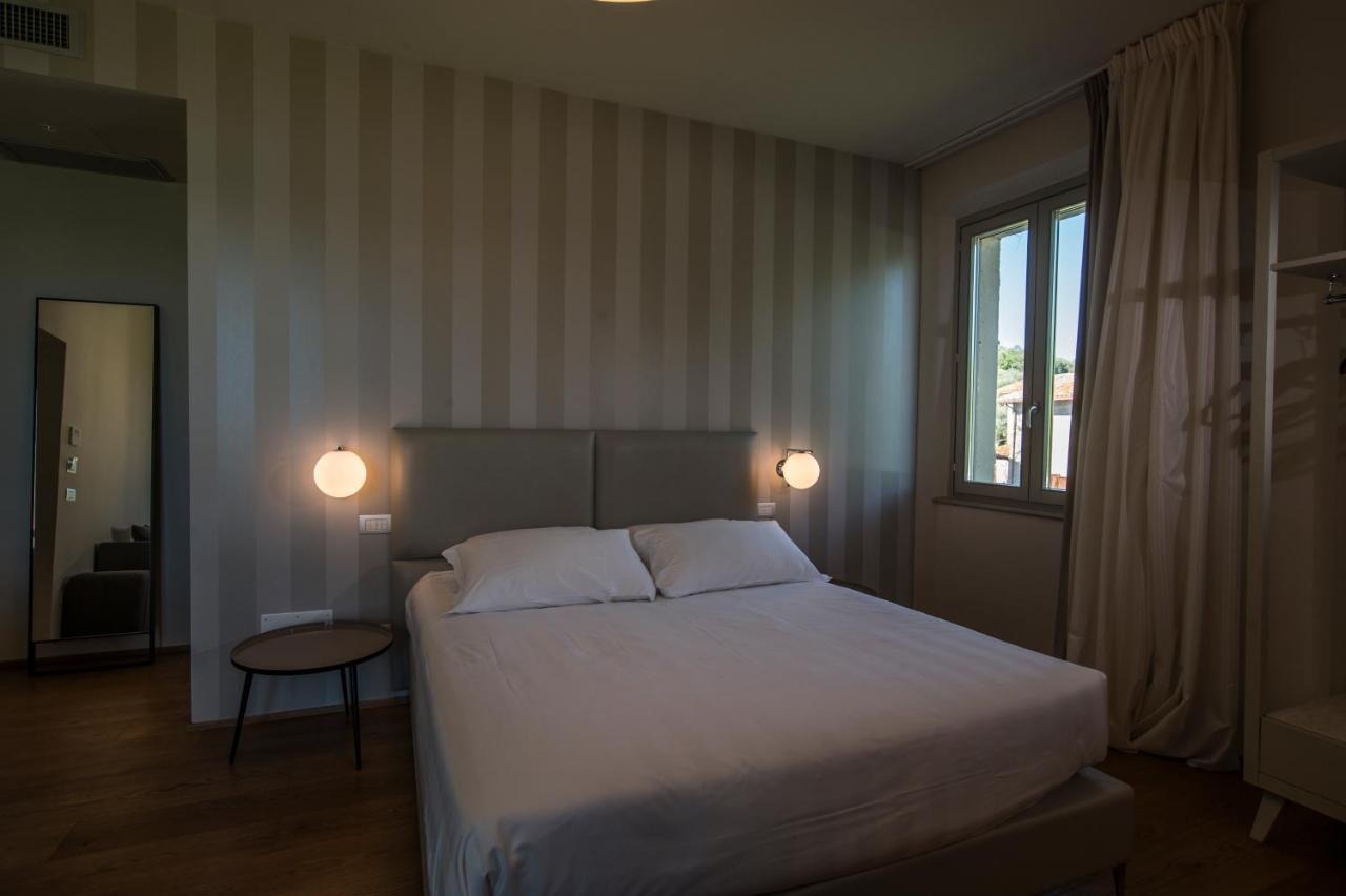קאסטיגליונה דל לאגו Isola Polvese Resort מראה חיצוני תמונה